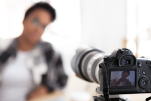 A person posing for an instagram photo he will be posting to his profile.